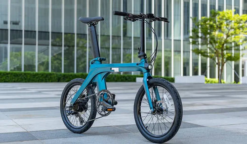 The Fiido X electric bike parked in a modern cityscape