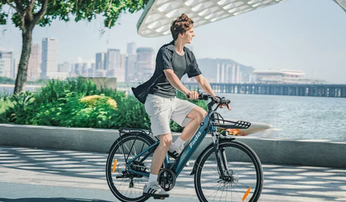 Fiido C11 Pro urban e-bike with a man riding on a sunny day