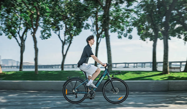 A man commutes on a Fiido C11 Pro urban commuter e-bike.