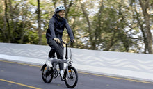 A man rides the Fiido D11 2025 version for a ride