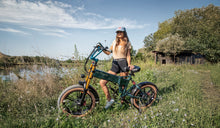 A woman is exercising on a Fiido M1 Pro fat-tire electric bike.