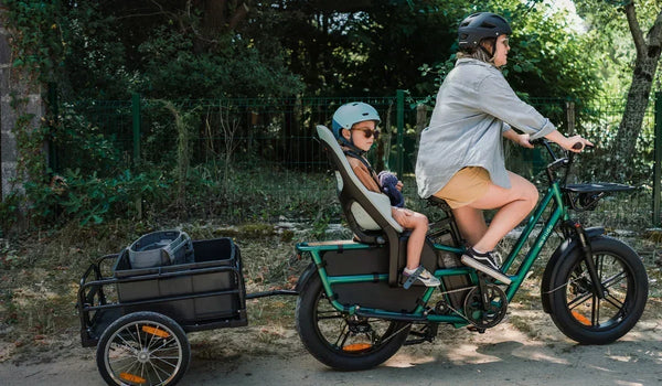 Fiido T2 cargo e-bike carrying children with a woman riding on a sunny day