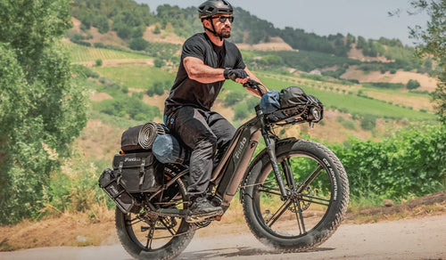 A man riding a Fiido Titan long range ebike