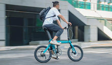 Lee commutes to work on a Fiido X foldable electric bicycle.