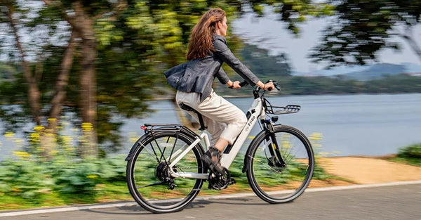 Woman riding fiido c11 ebike by the lake